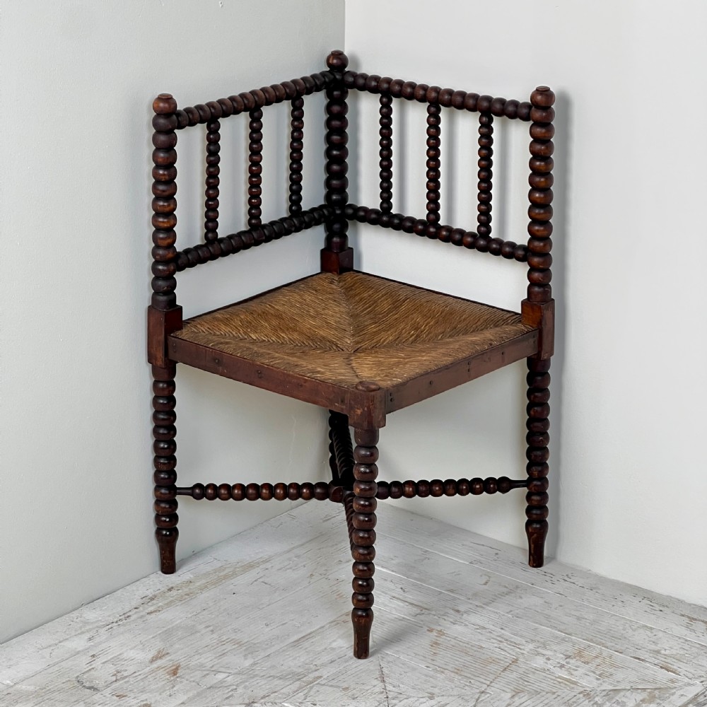 A 19th Century Corner Bobbin Chair With Rush Seat View II