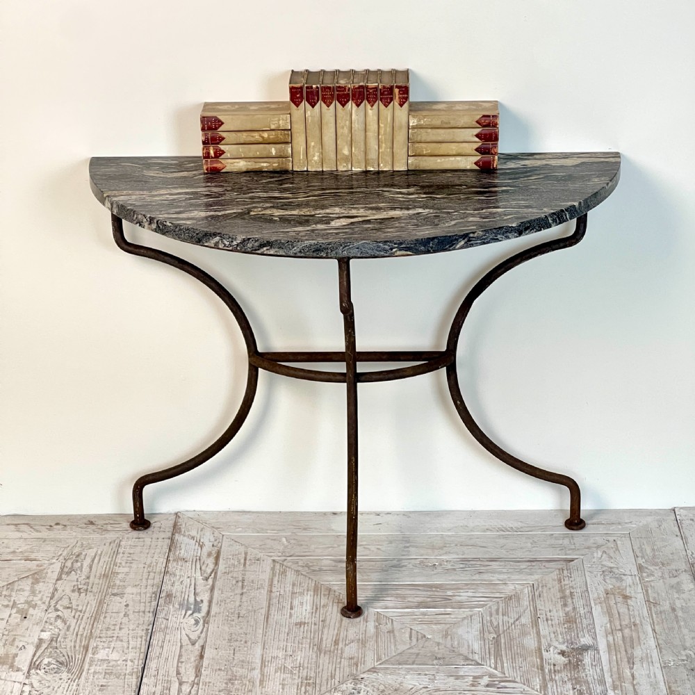 A Wrought Iron And Granite Topped Console Table (Pair Available) View II
