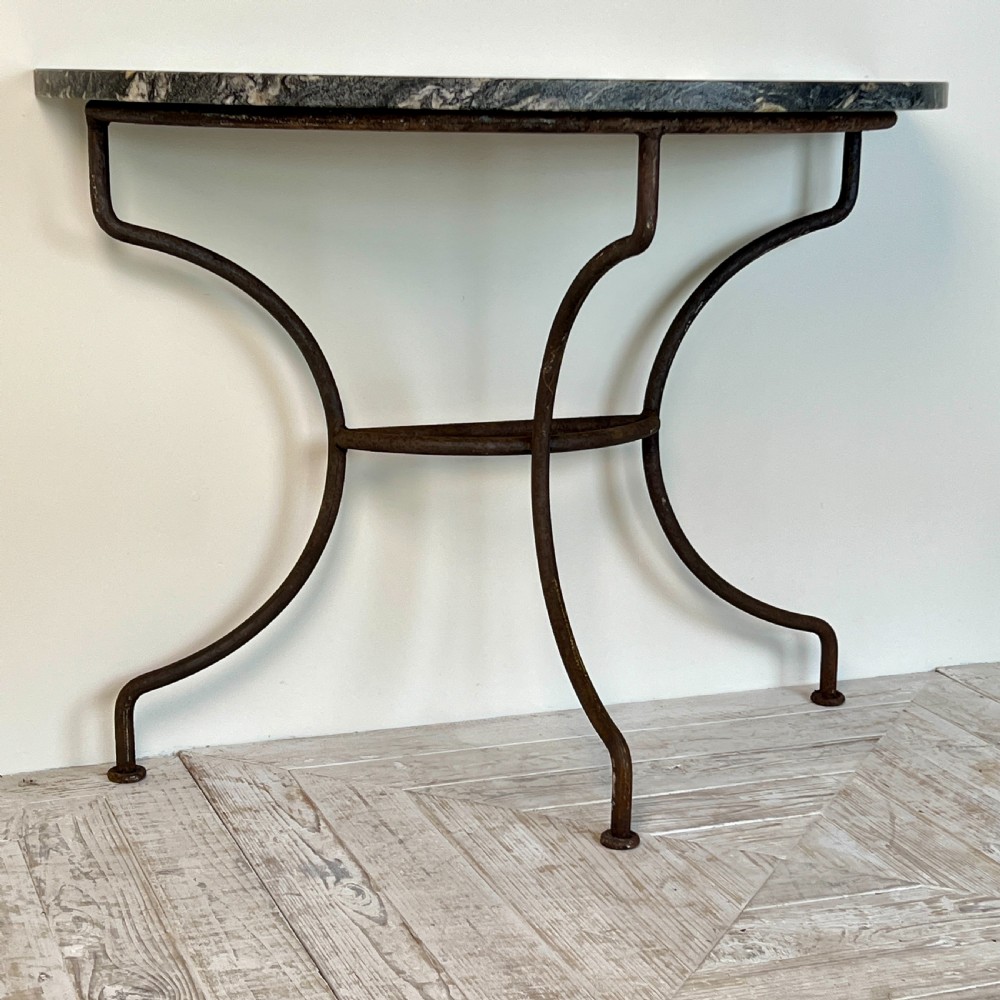 A Wrought Iron And Granite Topped Console Table (Pair Available) View IV