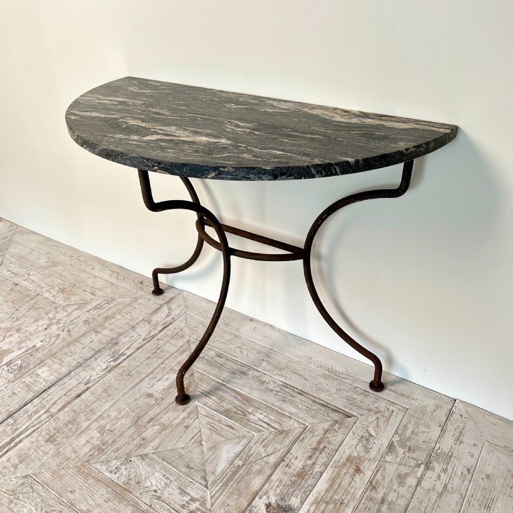 A Wrought Iron And Granite Topped Console Table (Pair Available) View VII