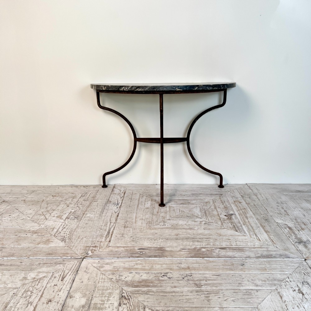 A Wrought Iron And Granite Topped Console Table (Pair Available) View IX