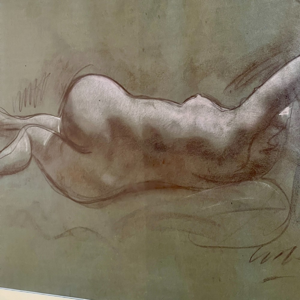 A framed charcoal and chalk life study drawing depicting a reclining female nude figure on toned paper. View VI