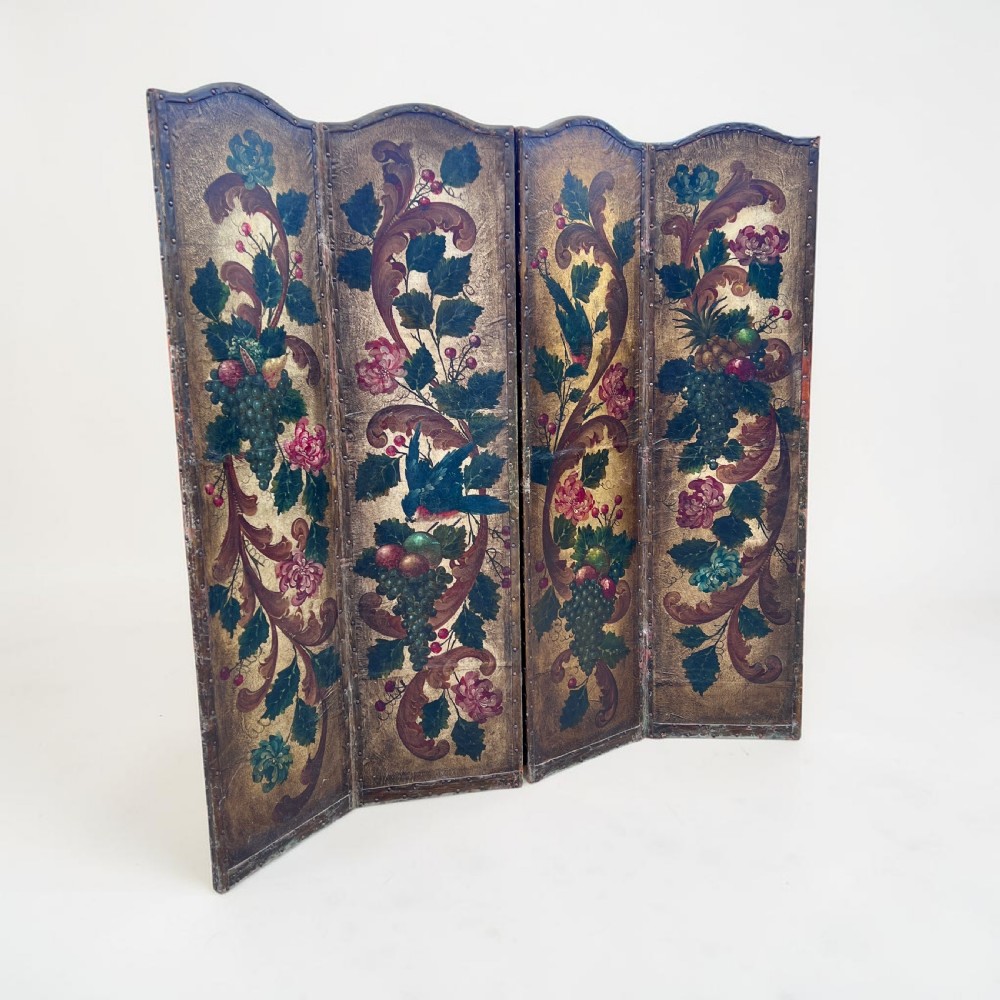 A four-panel French room divider screen made of gilt leather hand-painted with green foliage, floral scrolls, and birds, bordered with brass studding. View IV