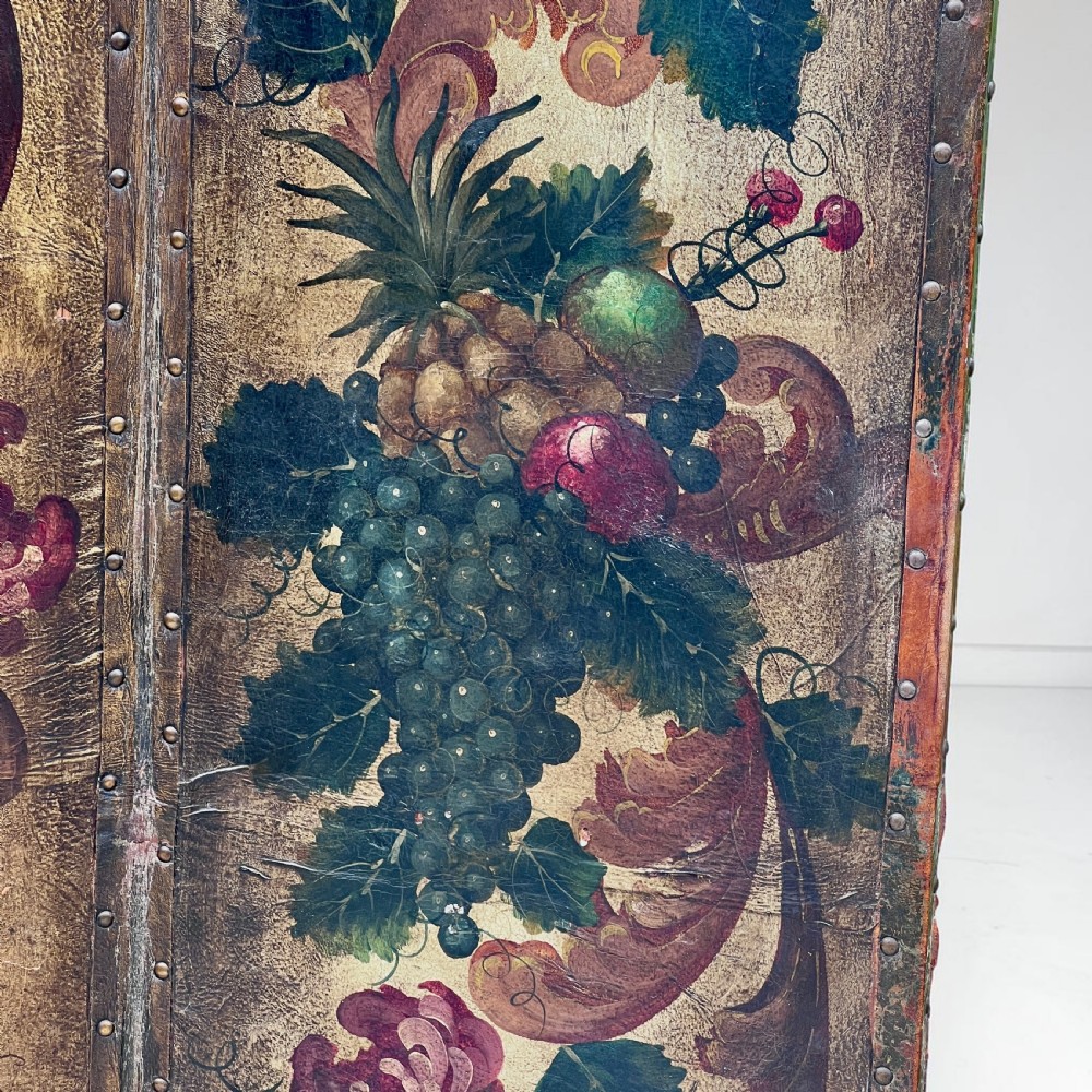 A four-panel French room divider screen made of gilt leather hand-painted with green foliage, floral scrolls, and birds, bordered with brass studding. View VII