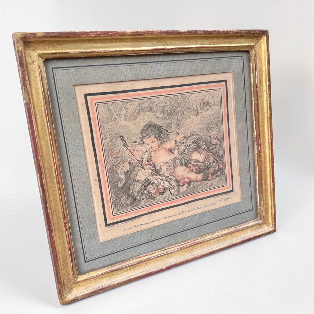 A pair of 18th-century French engravings depicting classical cherubs, mounted and framed in rectangular giltwood frames. View II