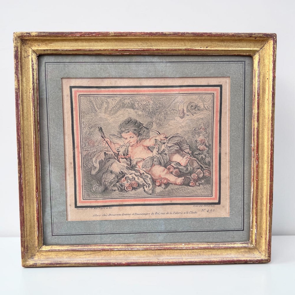 A pair of 18th-century French engravings depicting classical cherubs, mounted and framed in rectangular giltwood frames. View IV