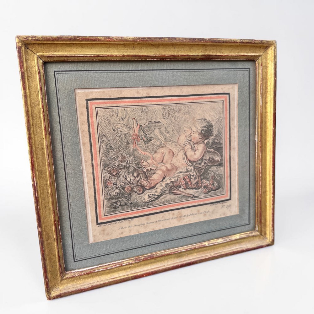 A pair of 18th-century French engravings depicting classical cherubs, mounted and framed in rectangular giltwood frames. View V