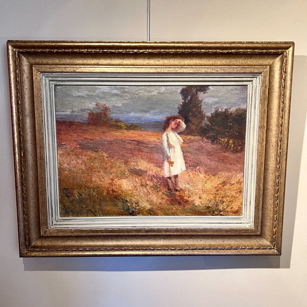 An impressionist oil painting depicting a young figure in a white dress standing in a sunlit field, presented in a moulded gilt frame. View VI