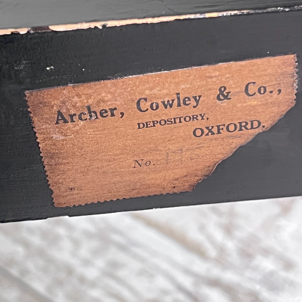 A nineteenth-century octagonal painted metal toleware tray table featuring a classical scene depicting the family of Darius before Alexander, set upon a dark wooden base. View IX