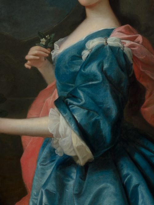 fig 3. An 18th-century oil painting depicting a woman in a blue satin dress beside a potted orange tree, framed in carved giltwood.
