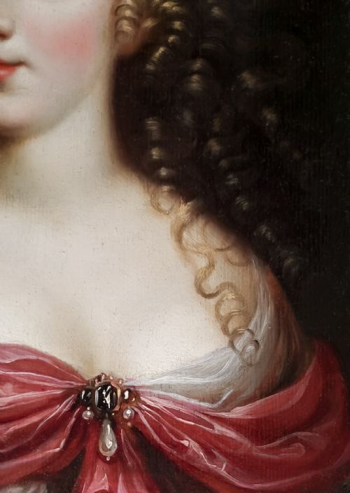 fig 3. A seventeenth-century Baroque oil painting on wood panel depicting a portrait of a woman in a red gown inside an elaborate gilded frame.
