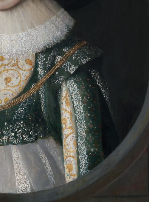 fig 3. A seventeenth-century Jacobean oil portrait on wood panel depicting a woman in a wide-brimmed hat, lace ruff, and embroidered green bodice within a dark frame.