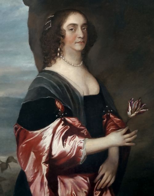 fig 2. A seventeenth-century oil portrait of a lady in a black dress with draped red satin sleeves and pearls, set within an ornate carved gilt frame.