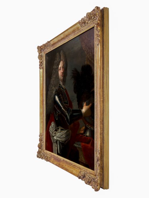 fig 2. An 18th-century oil painting on canvas depicting a gentleman in plate armour and a full wig within a carved gold gilt frame.
