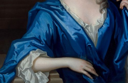 fig 8. An eighteenth-century oil portrait of a lady draped in a blue mantle, set within an intricate carved giltwood frame.