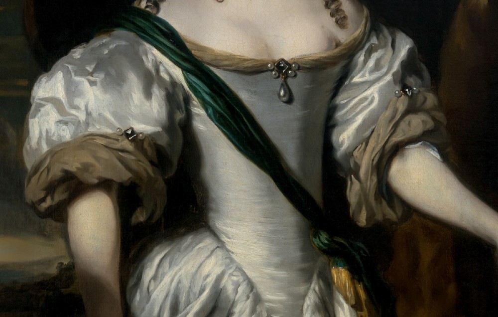 A three-quarter length oil portrait depicting a woman in a white satin gown with a green sash, set within an ornate carved gilded frame. View VI