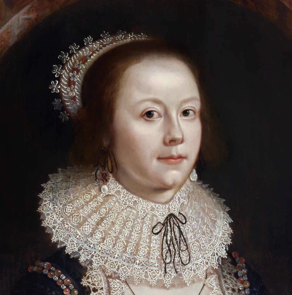 A seventeenth-century oil painting on wood panel depicting a lady in a black dress with an elaborate lace collar, set within a painted oval frame. View VI