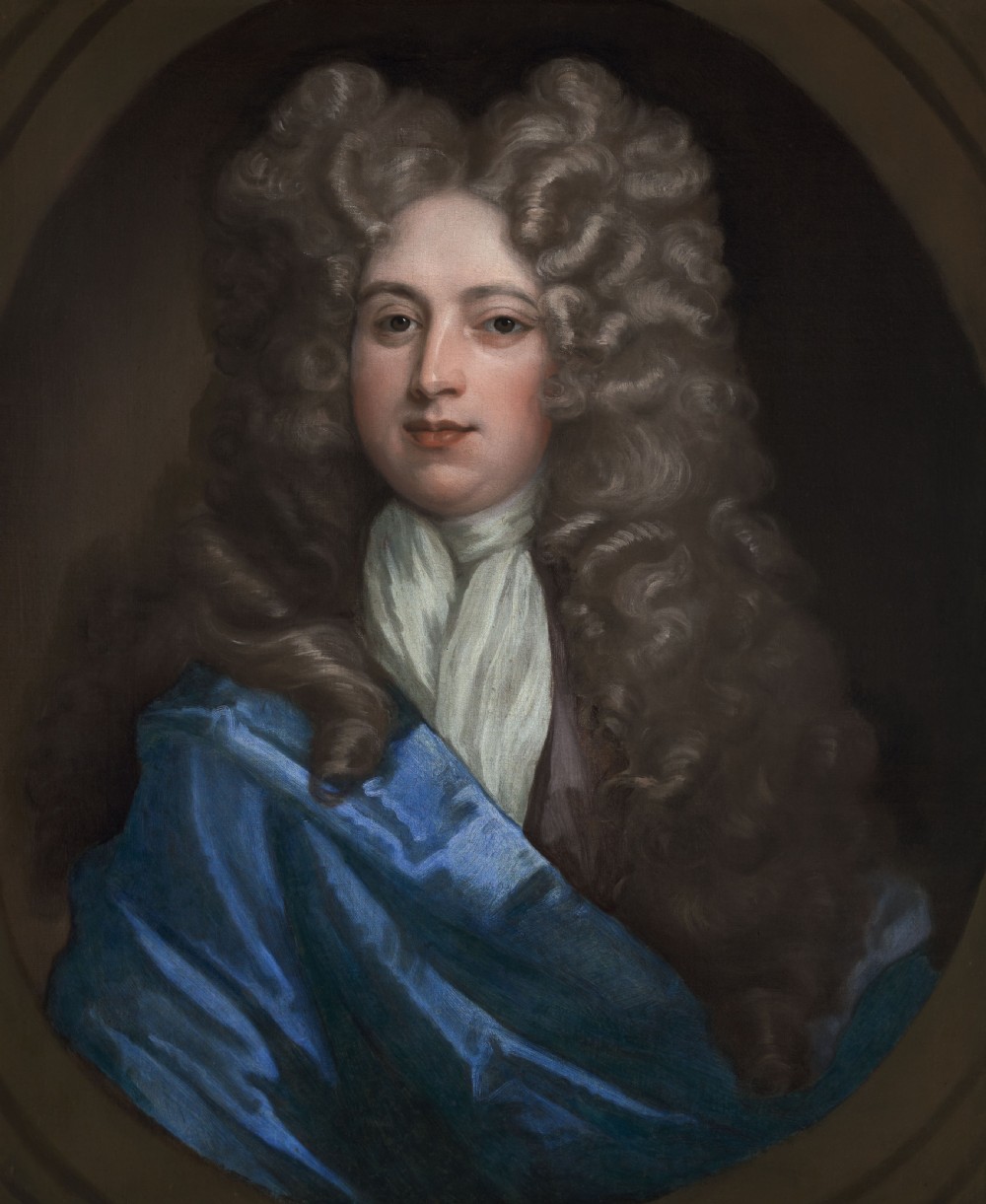An oil on canvas portrait depicting a gentleman in a full brown periwig and draped blue cloak set within an oval spandrel and carved gold frame. View IV
