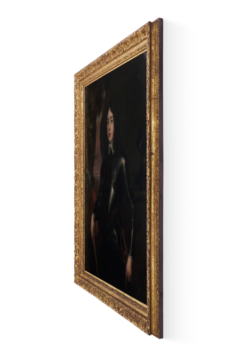 A seventeenth-century oil painting on canvas depicting a military officer in dark armour with a horse and groom in the background, set within a carved gold frame. View II