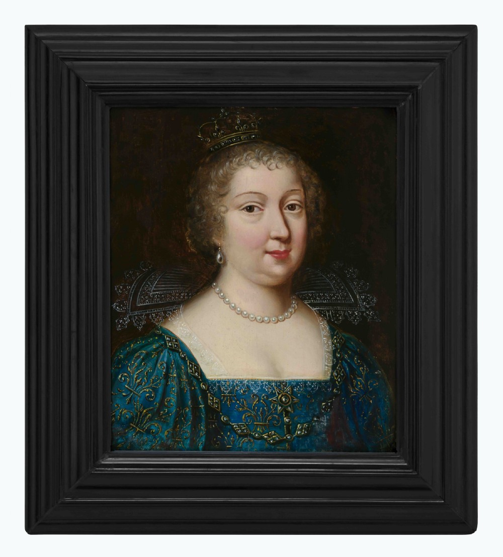A 17th-century oil portrait painting on wood panel depicting Maria Therese of Spain in an embroidered blue dress with a lace collar, set within a wide ebonised frame.