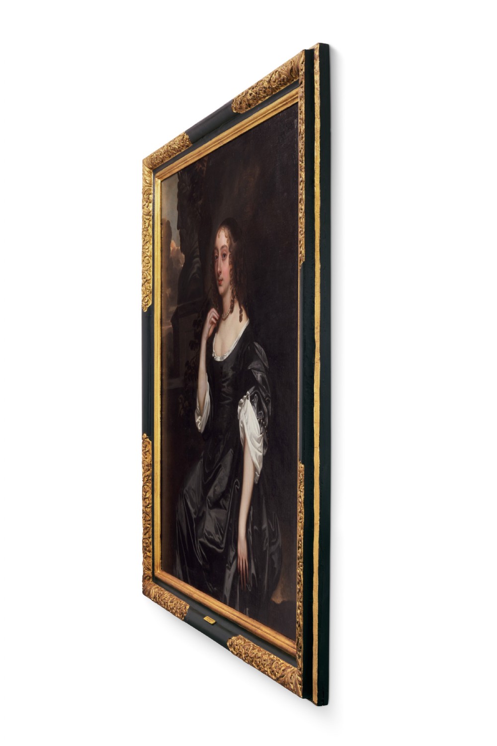 A seventeenth-century oil portrait of a lady in a black gown with pearl jewellery, presented in an ebonised and gilt cornered timber frame. View II