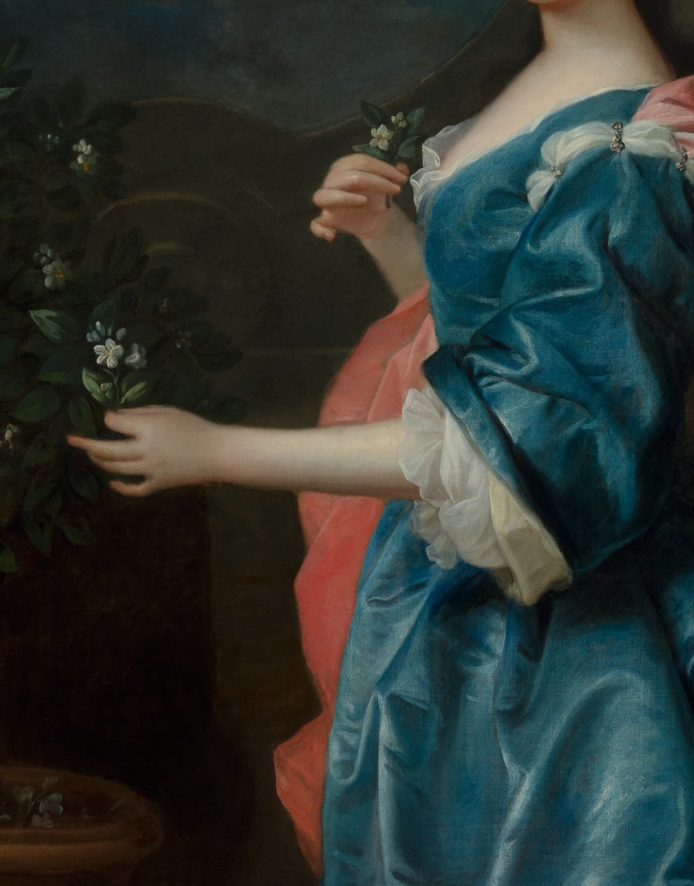 An 18th-century oil painting depicting a woman in a blue satin dress beside a potted orange tree, framed in carved giltwood. View IX