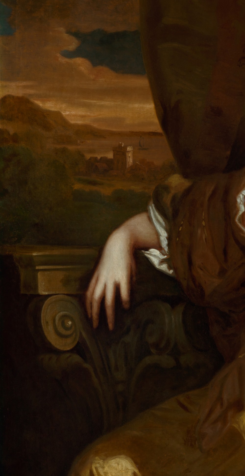 A 17th-century oil painting depicting a seated woman in a gold satin dress within a carved giltwood frame surmounted by a coronet. View XI