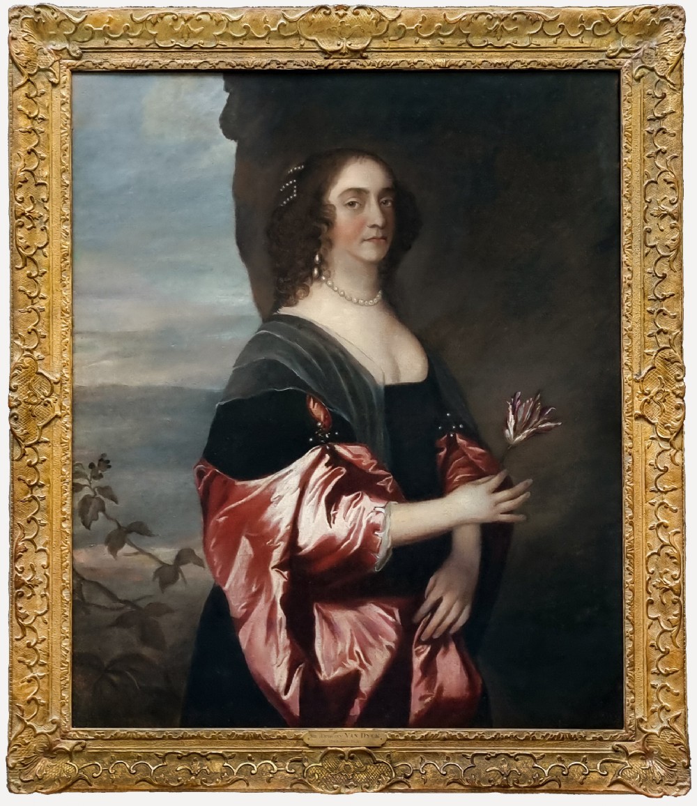 A seventeenth-century oil portrait of a lady in a black dress with draped red satin sleeves and pearls, set within an ornate carved gilt frame.