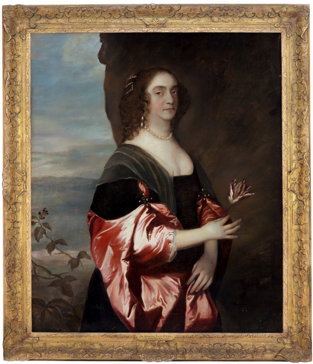 A seventeenth-century oil portrait of a lady wearing a black dress with red satin sleeves and pearls, housed in a carved gilded frame.