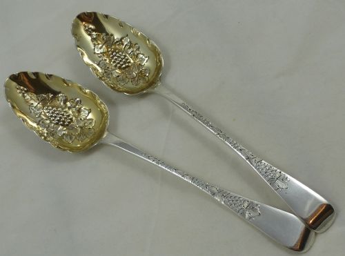 a near pair of early c19th hallmarked silver berry spoons - CATEGORY: ANTIQUE SILVER - DATED 19TH CENTURY