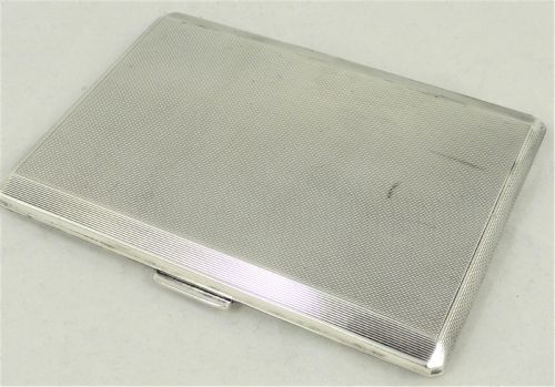 a sterling silver cigarette case - CATEGORY: ANTIQUE SILVER - DATED 1950