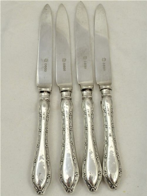 set of four silver handled butter knives - CATEGORY: ANTIQUE SILVER - DATED 1890