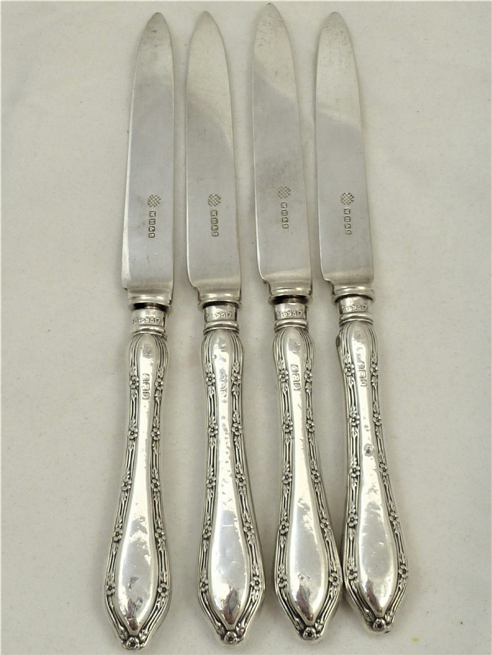 Set of Four Silver Handled Butter Knives
