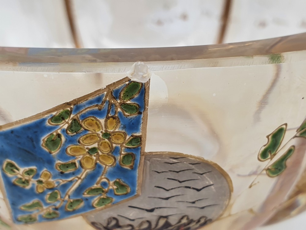 A footed amber crystal bowl featuring hand-enamelled Japanese-inspired floral motifs and geometric panels. View VIII