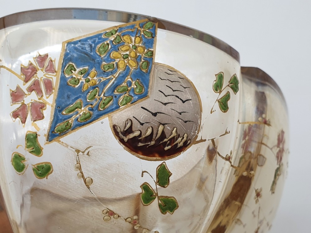 A footed amber crystal bowl featuring hand-enamelled Japanese-inspired floral motifs and geometric panels. View XIX