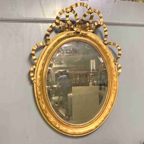 4' x 3' large french oval gilt mirror with ribbons - CATEGORY: ANTIQUE MIRRORS - DATED 1860