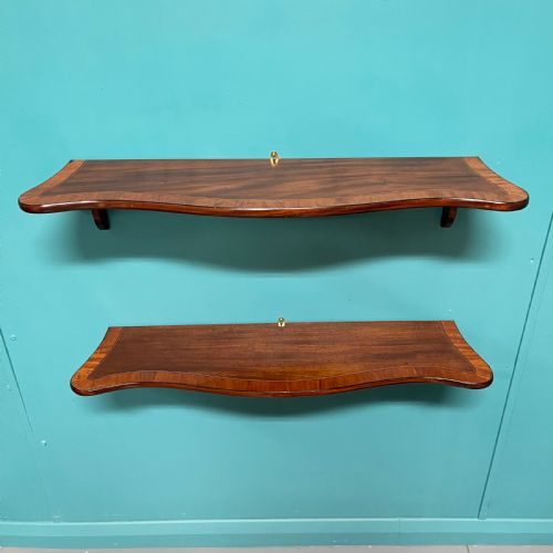 pair of serpentine hanging shelves - CATEGORY: ANTIQUE MISCELLANEOUS - DATED 19TH CENTURY