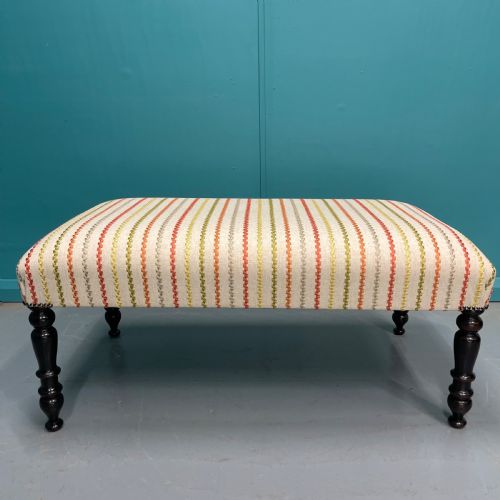 newly upholstered ottoman stool on ebonised legs - CATEGORY: ANTIQUE STOOLS - DATED 19TH CENTURY