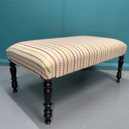 NEWLY UPHOLSTERED OTTOMAN STOOL ON EBONISED LEGS - ADDITIONAL PHOTO 2
