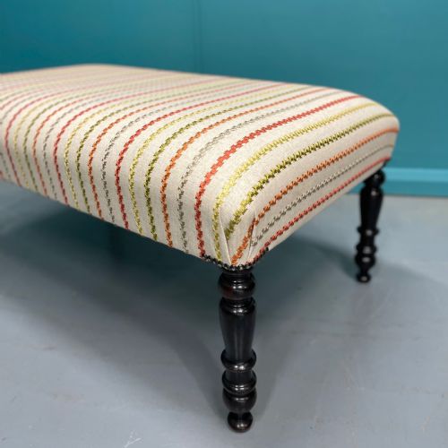 NEWLY UPHOLSTERED OTTOMAN STOOL ON EBONISED LEGS - ADDITIONAL PHOTO 3