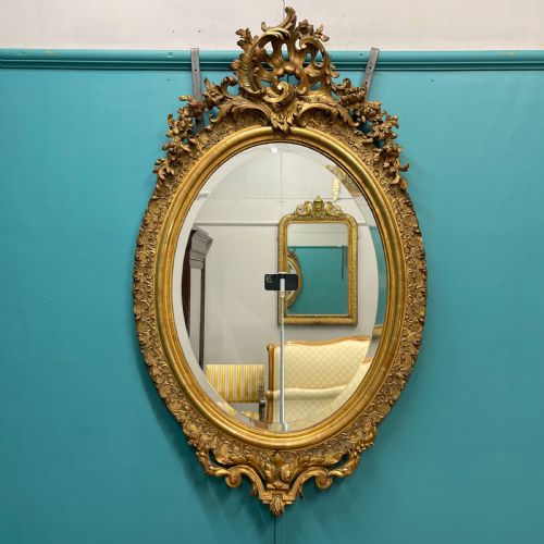 large french oval gilt mirror with bevelled glass - CATEGORY: ANTIQUE MIRRORS - DATED 19TH CENTURY