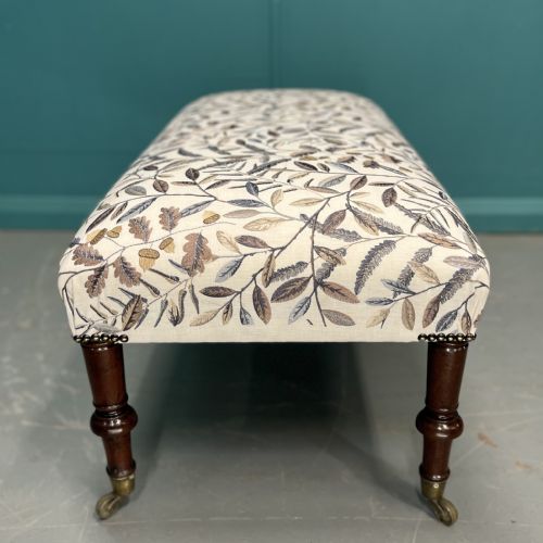 NEWLY UPHOLSTERED LEAF MOTIF FOOTSTOOL ON CASTORS - ADDITIONAL PHOTO 5