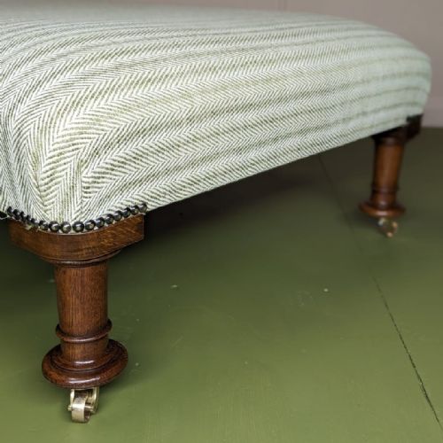 LARGE NEWLY UPHOLSTERED FOOTSTOOL ON CASTORS - ADDITIONAL PHOTO 1