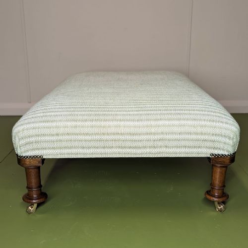 LARGE NEWLY UPHOLSTERED FOOTSTOOL ON CASTORS - ADDITIONAL PHOTO 3