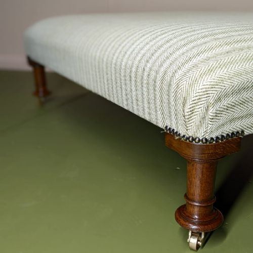 LARGE NEWLY UPHOLSTERED FOOTSTOOL ON CASTORS - ADDITIONAL PHOTO 4