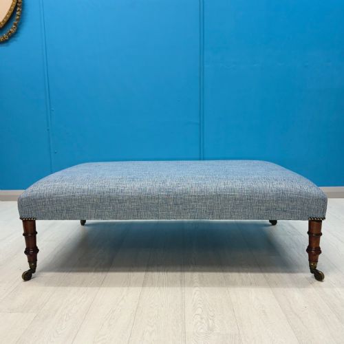 LARGE NEWLY UPHOLSTERED FOOTSTOOL ON REGENCY LEGS WITH CASTORS - ADDITIONAL PHOTO 2