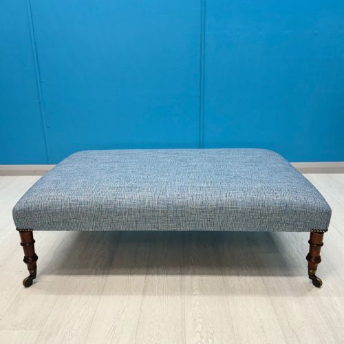 LARGE NEWLY UPHOLSTERED FOOTSTOOL ON REGENCY LEGS WITH CASTORS - ADDITIONAL PHOTO 4