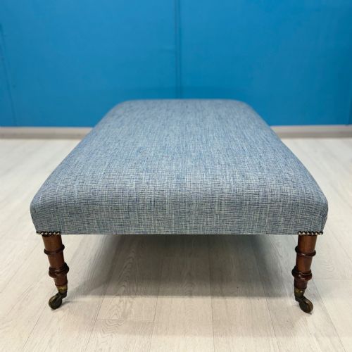 LARGE NEWLY UPHOLSTERED FOOTSTOOL ON REGENCY LEGS WITH CASTORS - ADDITIONAL PHOTO 5