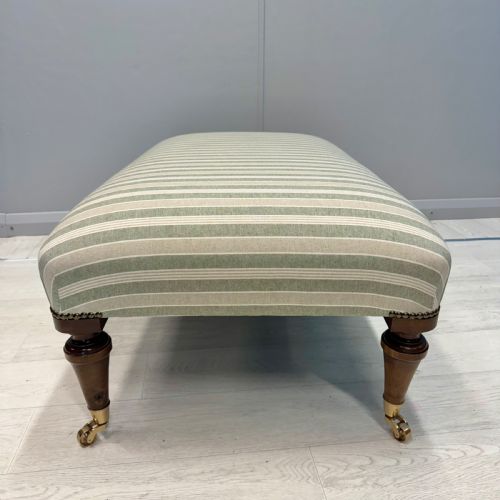 UPHOLSTERED FRENCH FOOTSTOOL ON BRASS CASTORS - ADDITIONAL PHOTO 2