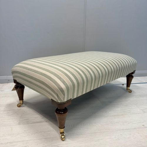UPHOLSTERED FRENCH FOOTSTOOL ON BRASS CASTORS - ADDITIONAL PHOTO 4